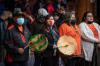 DARRYL DYCK - THE CANADIAN PRESS
Tk’emlúps te Secwépemc Kúkpi7 (Chief) Rosanne Casimir, second left, plays a drum during a ceremony to honour residential school survivors and mark the first National Day for Truth and Reconciliation, in Kamloops, B.C..on Sept. 30, 2021.