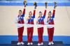 MARTIN BUREAU - AFP via GETTY IMAGES
Gold medalists Russia's Liliia Akhaimova, Russia's Angelina Melnikova Russia's Viktoriia Listunova and Russia's Vladislava Urazova celebrate on the podium after winning the artistic gymnastics women's team final.