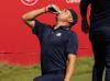 Montana Pritchard  -  Getty Images
After a beer was thrown at his feet from the gallery, American Justin Thomas popped the top, got down on a knee and chugged. The crowd roared, and an internet sensation was born.