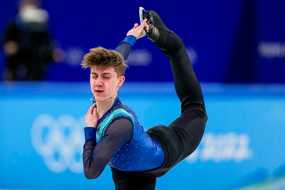 David J. Phillip - AP
Toronto’s Roman Sadovsky, Canada’s No. 2 male, had a shaky debut, placing eighth in the men’s short of the team figure skating event with a score of 71.06.