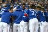 Jon Blacker - THE CANADIAN PRESS
Blue Jays second baseman Marcus Semien, centre, celebrates with teammates after the first walk-off home run of his career gave Toronto a 1-0 win over Boston in the first game of a doubleheader Saturday.