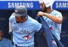 Gerry Angus -  Getty Images
Blue Jay Lourdes Gurriel Jr. helps teammate Marcus Semien slip into the home run jacket after launching his 30th of the season in the eighth inning against the Tigers at the Rogers Centre.