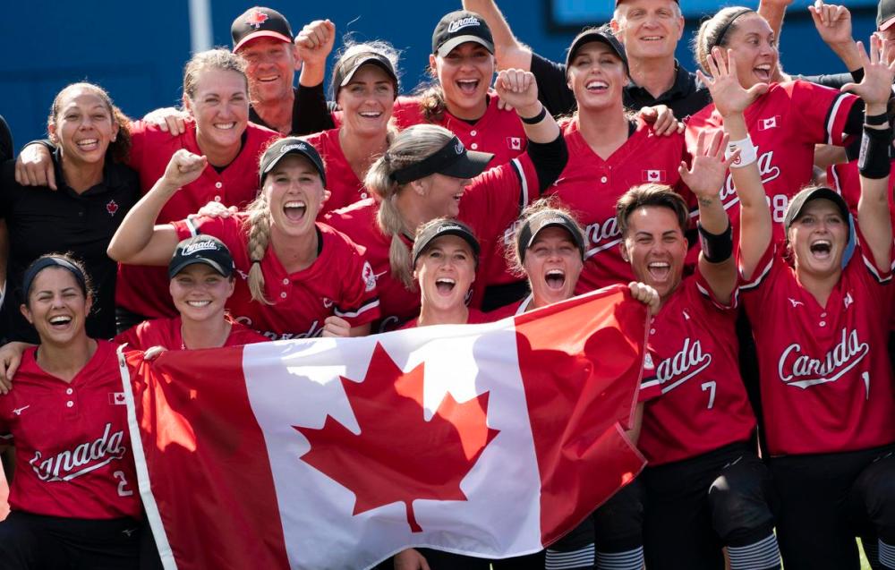 - THE CANADIAN PRESS
Canada’s women’s softball team pose for a photo with the Canadian flag after their win over Mexico in the bronze medal game at the Tokyo Olympics, Tuesday, July 27, 2021 in Yokohama, Japan.