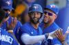 Mike Carlson - The Associated Press
George Springer, right, congratulates Lourdes Gurriel Jr. after Gurriel scored an eighth-inning run. Springer had already been removed from the game as the Jays continued to take a cautious approach with their prized free-agent acquisition.