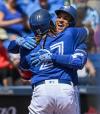 Steve Nesius - THE CANADIAN PRESS
“(He) embraced me from day one, allowed me to be myself and enjoy being at the ballpark,” George Springer said of Vladimir Guerrero Jr.