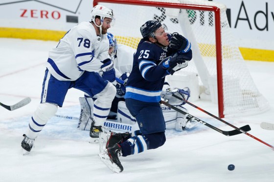 CPPaul Stastny goes down after getting a high stick to the face from T.J Brodie, which knocked out a tooth or two. (John Woods / The Canadian Press)