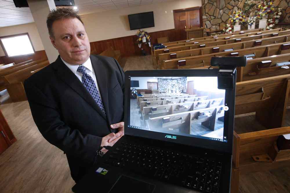 JOHN WOODS / WINNIPEG FREE PRESS
Michael Vogiatzakis, general manager of Voyage Funeral Home, is setting up live streaming in his funeral home in Winnipeg in order to allow viewings during the social distancing era.