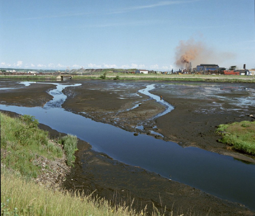 OWEN FITZGERALD - SYDNEY STEEL
A view of the Sydney tar ponds, and steel mill in the background, in the 1970s.