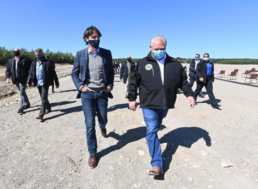 Nathan Denette - THE CANADIAN PRESS
Justin Trudeau, left, talks with Premier Doug Ford after taking part in a ground breaking event at the Iamgold Cote Gold mining site in Gogama, Ont. on Sept. 11, 2020.
