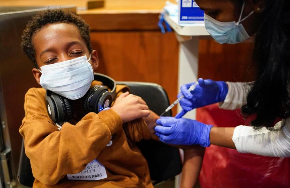 - AP
Cameron West, 9, receives a COVID-19 vaccination in Englewood, N.J., on Nov. 8, 2021.
