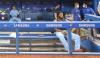 Steve Russell - Toronto Star
Vladimir Guerrero Jr. watches from the dugout as the Red Sox’s comeback victory over the Nationals plays out on the big screen at the Rogers Centre on Sunday.