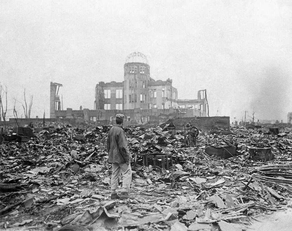 Stanley Troutman / Associated Press files
An allied correspondent stands in the rubble of the shell of a building that once was a movie theater in Hiroshima, Japan, on Sept. 8, 1945. (CP PICTURE ARCHIVE/AP/)