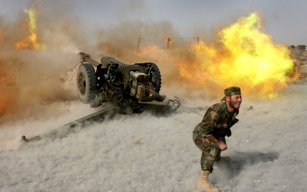 JOE BRYKSA/WINNIPEG FREE PRESS
WINNIPEG OUT-WEB OUT-Panjwayi District, Afghanistan- A Afghanistan National Army member grimaces as he fires a Russian made 122mm D 30 artillery gun during training by the Operational Mentoring and Liaison Team at a forward operating base in the Panjwayi District of Afghanistan Thursday morning- Aug 07, 2008