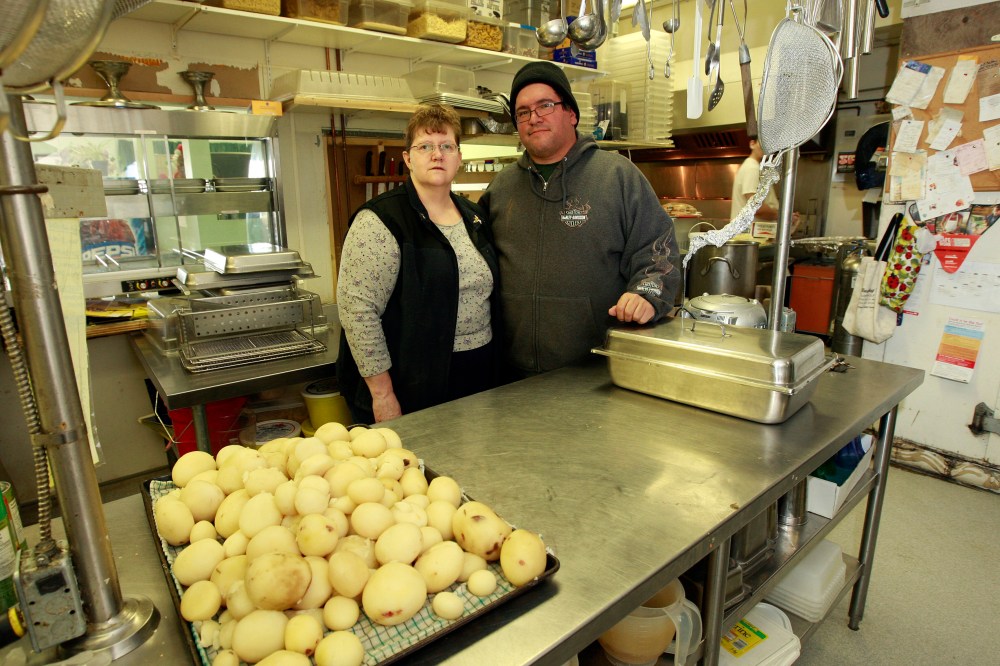 Mill worker Kim Wilson with his wife Laurie maintain a positive attitude. Their gas/resturant business has been suffering the loss of business from the lockout.