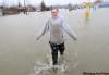 JOE.BRYKSA@FREEPRESS.MB.CA
Siri Rasmussen walks from her flooded neighborhood on Ramona Ave in Sunrise Acres neighbourhood of West Fargo , North Dakota- Cass County is experiencing unprecedented overland flooding  from the Red and Sheyenne Rivers  -JOE BRYKSA/WINNIPEG FREE PRESS- Apr 10, 2011
