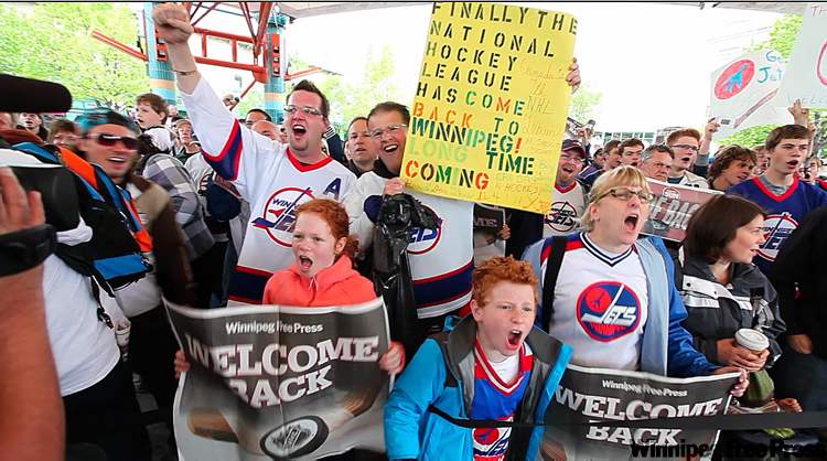 Ruth Bonneville Winnipeg Free Press
NHL Hockey fans scream under the canopy at The Forks to celebrate the return of the NHL.