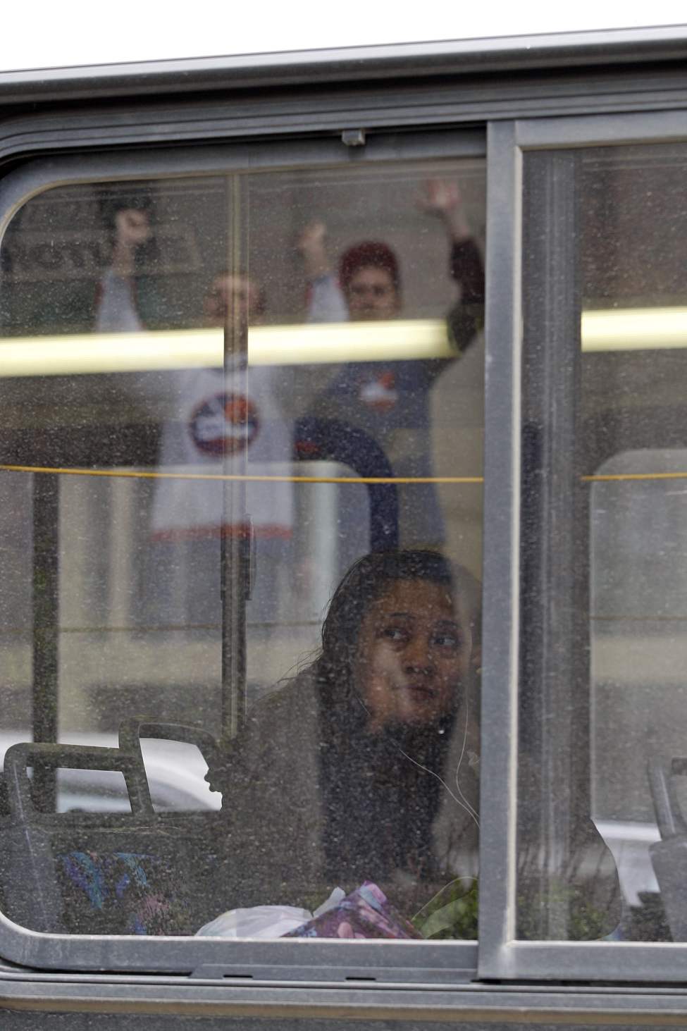 KEN GIGLIOTTI / WINNIPEG FREE PRESS
NHL comes back to Winnipeg - fans at Portage and main serenade transit bus rider