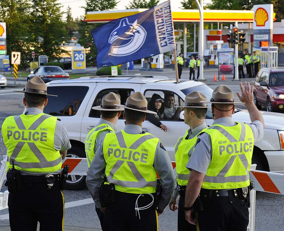 It is very quiet as more police than fans attend