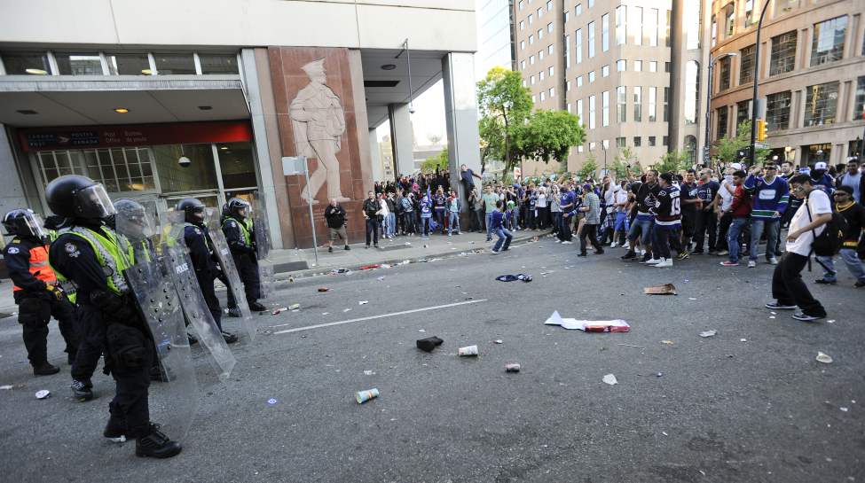 Hockey fans riot after game 7 of the Stanley Cup finals between the Canucks and the Boston Bruins in Vancouver, BC Wednesday, June 15, 2011. (Photo by Jason Payne/ PNG)