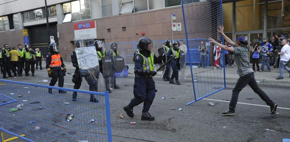 Hockey fans riot after game 7 of the Stanley Cup finals between the Canucks and the Boston Bruins in Vancouver, BC Wednesday, June 15, 2011. (Photo by Jason Payne/ PNG)