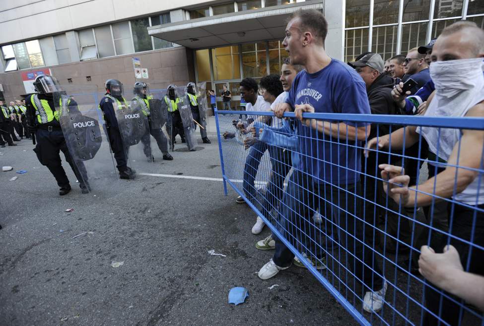 Hockey fans riot after game 7 of the Stanley Cup finals between the Canucks and the Boston Bruins in Vancouver, BC Wednesday, June 15, 2011. (Photo by Jason Payne/ PNG)