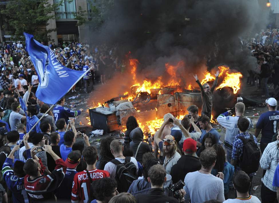 Hockey fans riot after game 7 of the Stanley Cup finals between the Canucks and the Boston Bruins in Vancouver, BC Wednesday, June 15, 2011. (Photo by Jason Payne/ PNG)