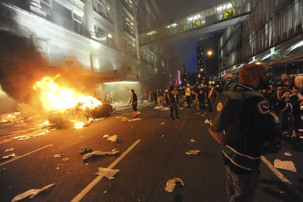 Rioters run amok after game 7 of the Stanley Cup finals between the Canucks and the Boston Bruins in Vancouver, BC Wednesday, June 15, 2011. (Photo by Jason Payne/ PNG)