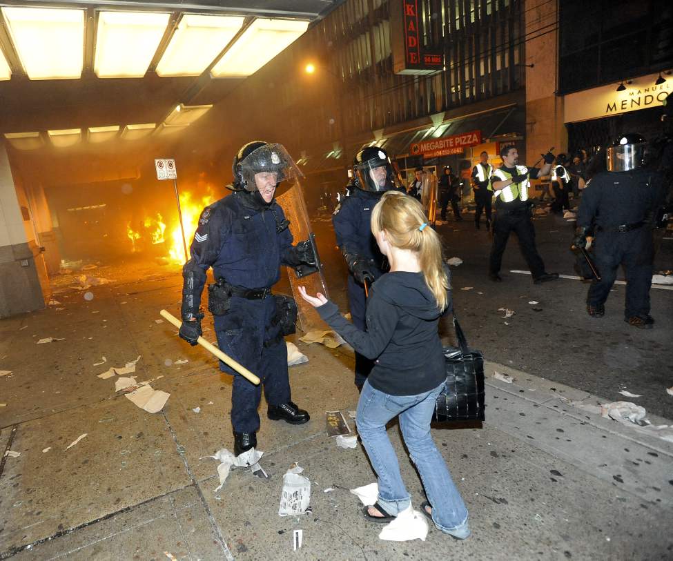 Rioters run amok after game 7 of the Stanley Cup finals between the Canucks and the Boston Bruins in Vancouver, BC Wednesday, June 15, 2011. (Photo by Jason Payne/ PNG)