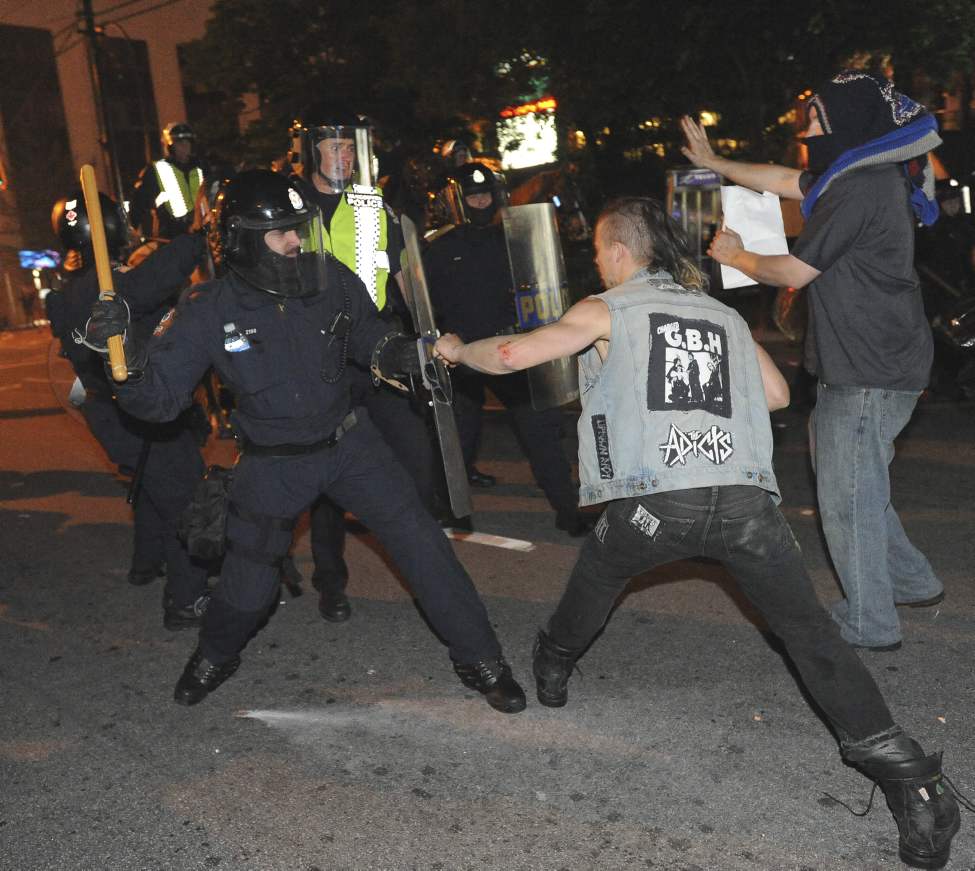 Rioters run amok after game 7 of the Stanley Cup finals between the Canucks and the Boston Bruins in Vancouver, BC Wednesday, June 15, 2011. (Photo by Jason Payne/ PNG)