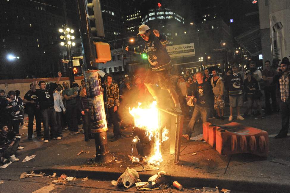 Rioters run amok after game 7 of the Stanley Cup finals between the Canucks and the Boston Bruins in Vancouver, BC Wednesday, June 15, 2011. (Photo by Jason Payne/ PNG)