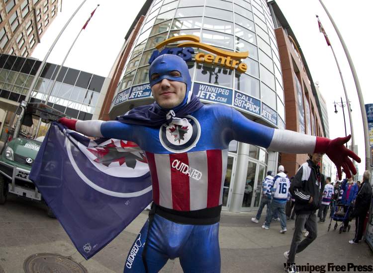 Ryan Gilmour, a hard-core Jets fan, outside MTS Centre before the game. (Trevor Hagan / Winnipeg Free Press)
