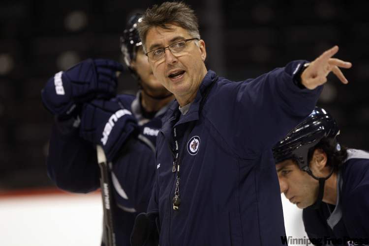 Jets coach Claude Noel directs his players during game-day practice at MTS Centre Monday. (Ken Gigliotti / Winnipeg Free Press)