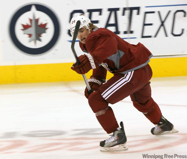 Joe Bryksa / Winnipeg Free Press
Phoenix Coyotes Lauri Korpikoski flies around the ice during practice Wednesday afternoon at the MTS Centre in Winnipeg. The Phoenix Coyotes are in Winnipeg preparing for a game against the Winnipeg Jets on Thursday night.