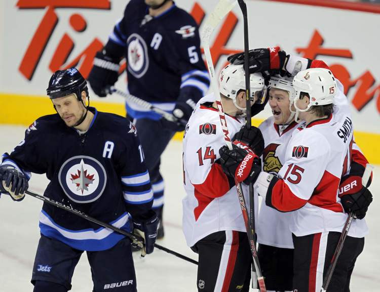 Boris Minkevich / Winnipeg Free Press
In the second period, Chris Neil scored a second goal for the Senators. Olli Olli Jokinen dejected after his shift failed to stop the goal.