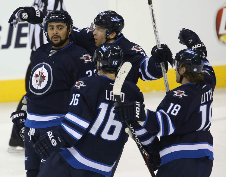 TREVOR HAGAN / WINNIPEG FREE PRESS
Winnipeg Jets' Dustin Byfuglien (33) opens the scoring in the first period.