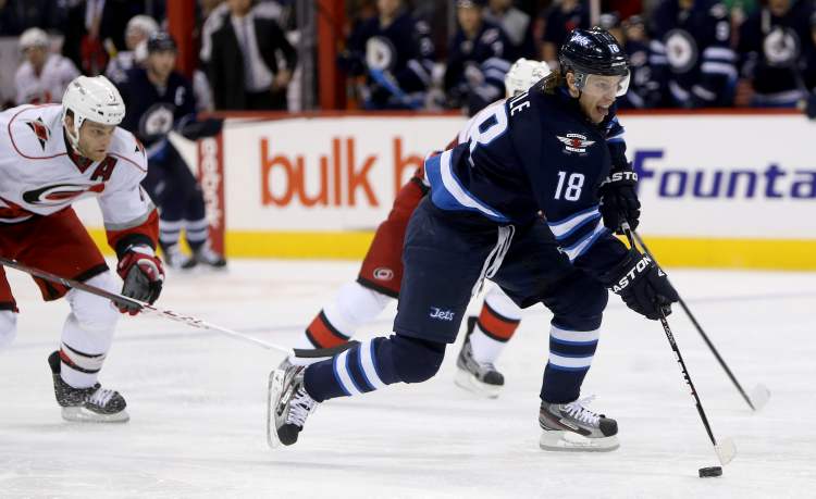 TREVOR HAGAN / WINNIPEG FREE PRESS
Winnipeg Jets' Bryan Little (18) skates towards the Carolina Hurricanes net on a breakaway during second-period action.