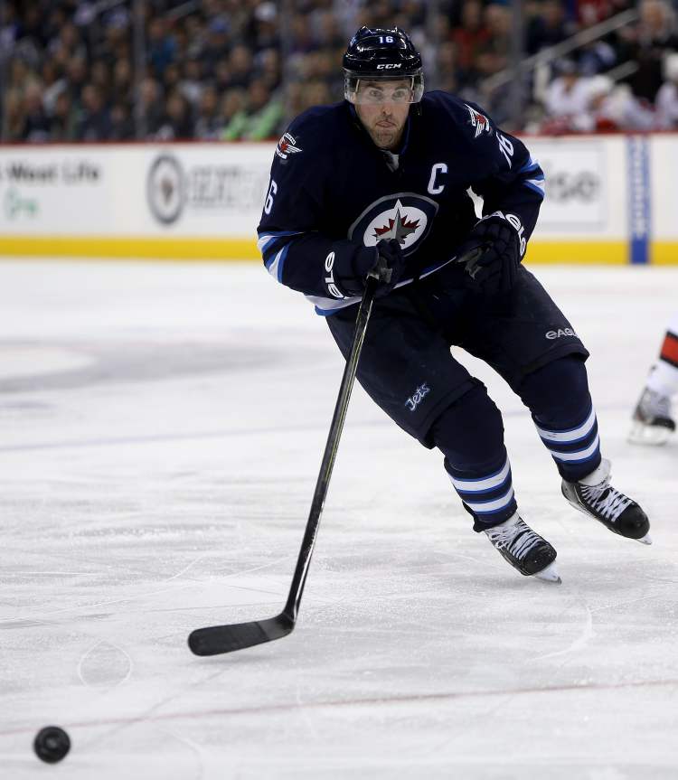 TREVOR HAGAN / WINNIPEG FREE PRESS
Winnipeg Jets captain Andrew Ladd rushes to the puck during second period action.