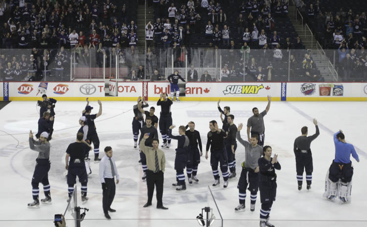 MIKE DEAL / WINNIPEG FREE PRESS
The Winnipeg Jets take to the ice one final time at the end of the final regular season game to salute the fans after losing to the Montreal Canadiens' 4-2.