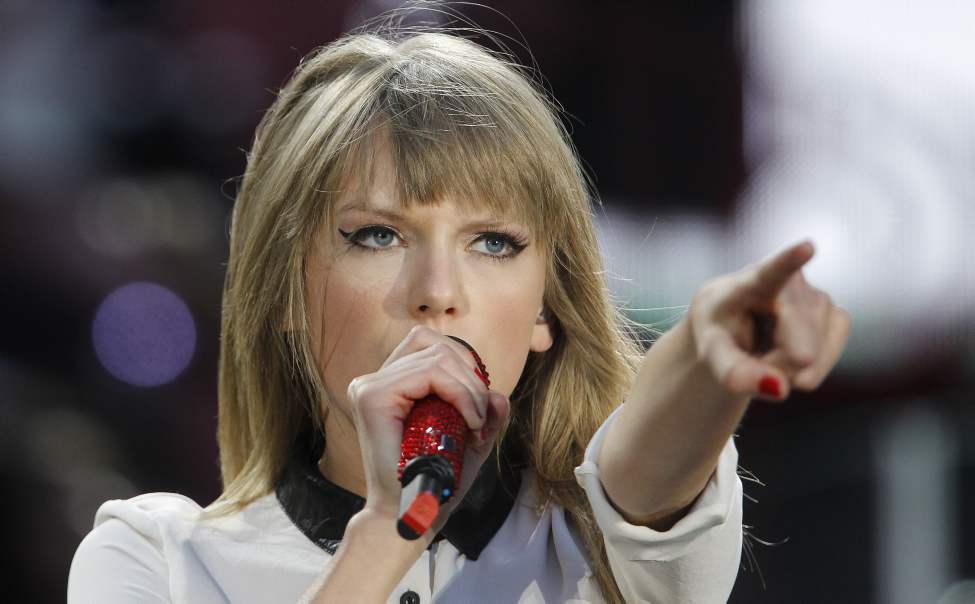 Trevor Hagan / Winnipeg Free Press
Taylor Swift performs at Investors Group Field, Saturday, June 22, 2013.