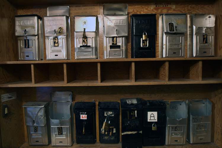 JOE BRYKSA / WINNIPEG FREE PRESS
Mailboxes inside a Furby Street rooming house.