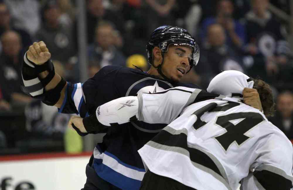 JOE BRYKSA / WINNIPEG FREE PRESS
Winnipeg Jets Evander Kane fights with Colin Fraser during the second period.