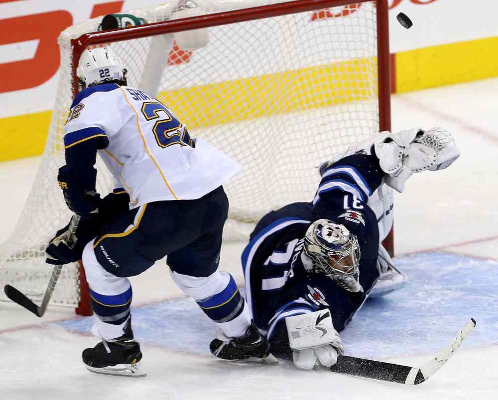 TREVOR HAGAN / WINNIPEG FREE PRESS
Ondrej Pavelec stops Kevin Shattenkirk of the St. Louis Blues during the shootout.