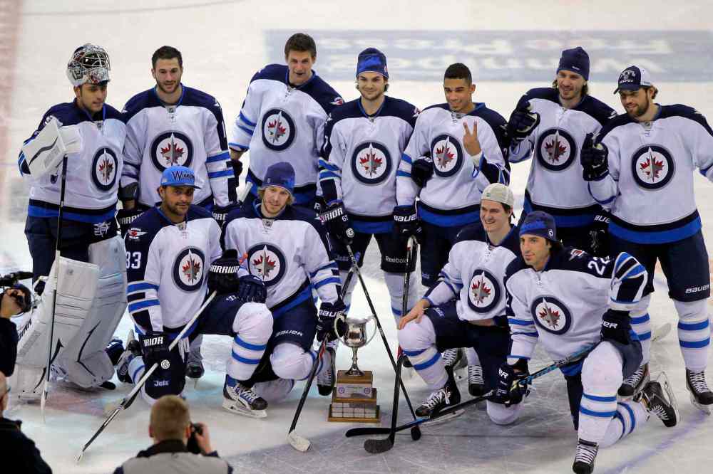 Boris Minkevich / Winnipeg Free Press
Team White poses with the trophy after winning the Winnipeg Jets Skills Competition at the MTS Centre Wednesday evening.