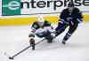 TREVOR HAGAN / WINNIPEG FREE PRESS
Minnesota Wild's Nino Niederreiter and Winnipeg Jets forward Matt Halischuk fight for the puck during the first period.