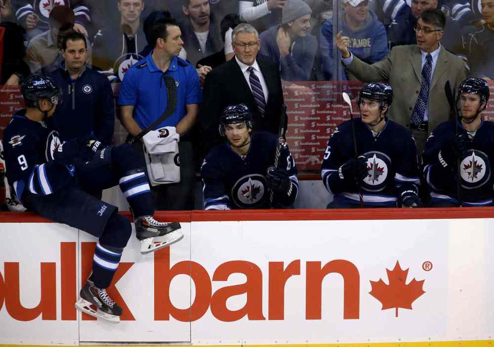 TREVOR HAGAN / WINNIPEG FREE PRESS
Winnipeg Jets' Evander Kane (left) listens to instructions from Winnipeg Jets head coach Claude Noel (top right) during the third period.