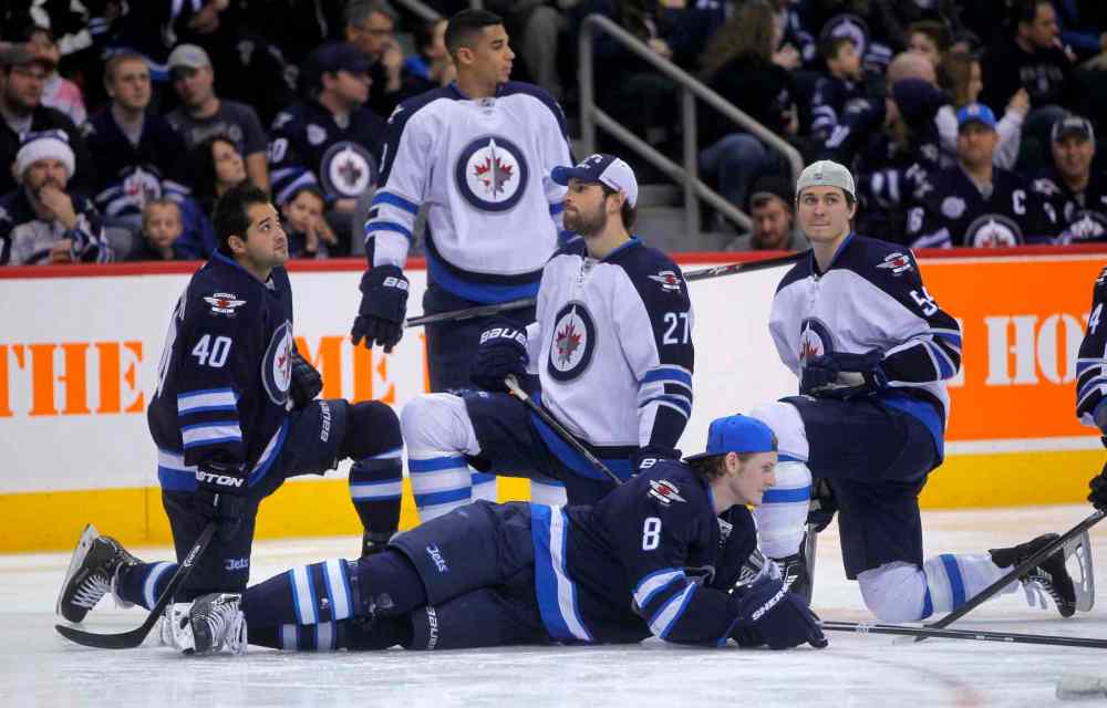 Boris Minkevich / Winnipeg Free Press
Members of the Winnipeg Jets were split up into Team White and Team Blue for the skills competition. Clockwise, from left: Devin Setoguchi, Evander Kane, Eric Tangradi, Mark Scheifele and Jacob Trouba.
