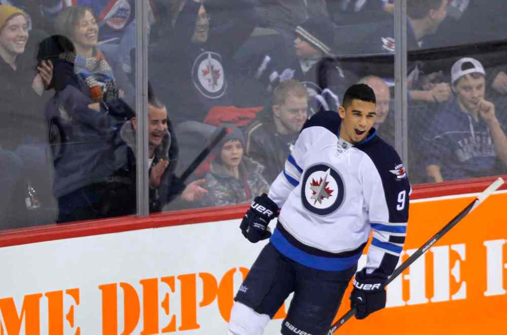 Boris Minkevich / Winnipeg Free Press
Evander Kane reacts after scoring on Al Montoya.