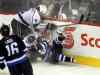 Phil Hossack / Winnipeg Free Press
Winnipeg Jets Bryan Little (18) goes down in a cloud of ice against Los Angeles Kings defenceman Drew Dougherty in first period action at the MTS Center Thursday, March 6.