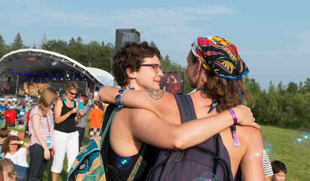 Sarah Taylor / Winnipeg Free Press
Candace Froebe and James Penner attend Folk Fest on Thursday. Penner says he is most excited to see Ben Harper at this year's festival.