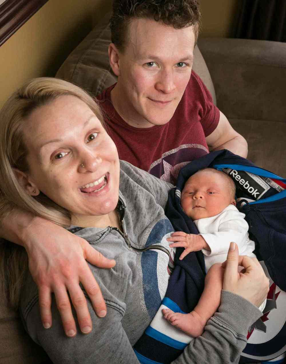 Justine and Jeremy Welwood with their two-day-old baby boy Jett, born April 13. He's not just named after the Winnipeg Jets; his parents both liked the name.